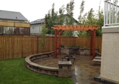 Paving stone patio, pergola, courtyard wall