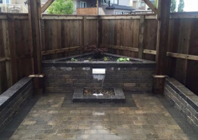 Paving stone patio, pergola, water feature