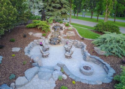 Front yard oasis, paving stone patio, water fall