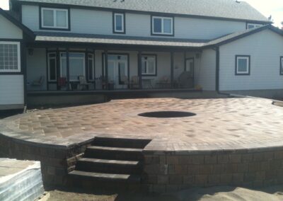 Raised fire pit patio