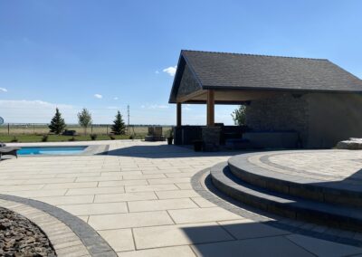 Lethbridge outdoor living space, paving stone pool patio