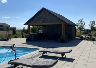 Lethbridge outdoor living space, paving stone pool patio
