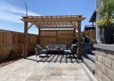 Backyard oasis, pergola, retaining wall