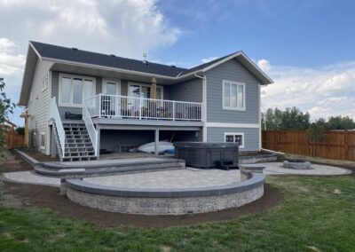 Paving stone patio, retaining wall, firepit