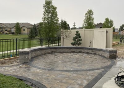 Paving stone patio, retaining wall